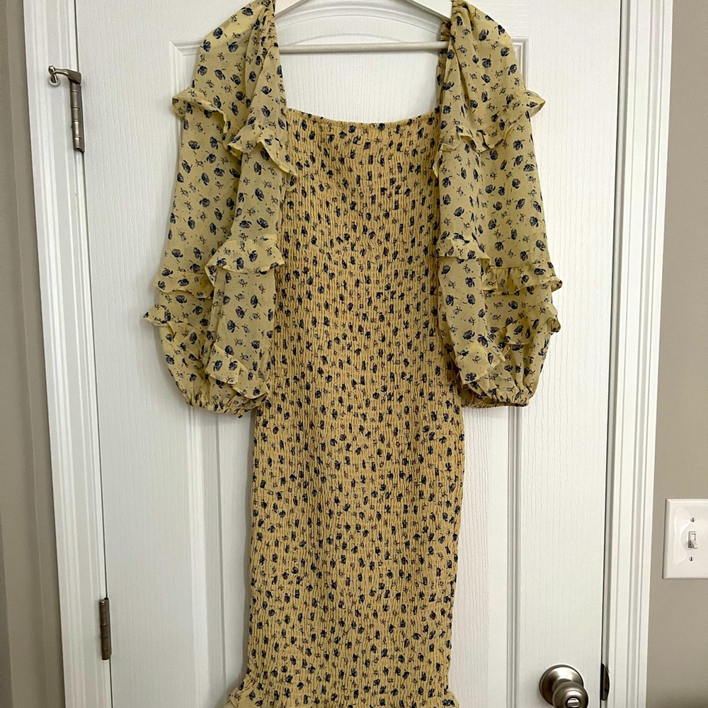 Yellow floral ruched petal and pup dress with balloon ruffle sleeve details